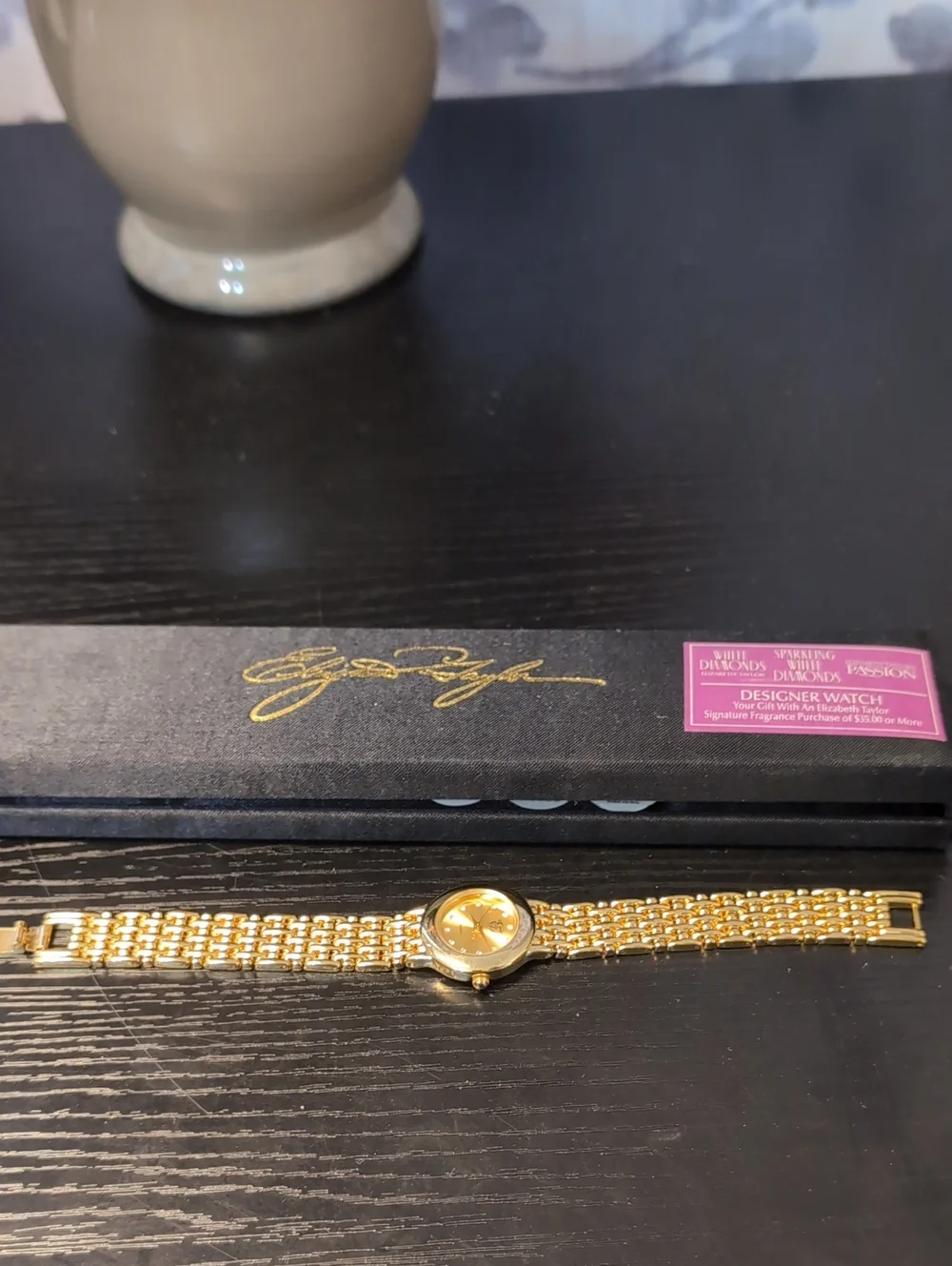 Elegant Gold-Tone Women's Bracelet Watch by Signature Designer